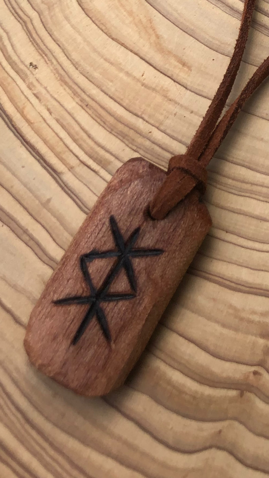 Protection Bind Rune hand carved amulet pendant necklace. Handmade from hardwood with detail added using pyrography.