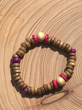 Load image into Gallery viewer, Handmade beaded bracelet on elastic. Made out hot pink, purple, brown and beige recycled beads.
