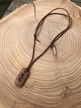 Load image into Gallery viewer, Protection Bind Rune hand carved amulet pendant necklace. Handmade from hardwood with detail added using pyrography.
