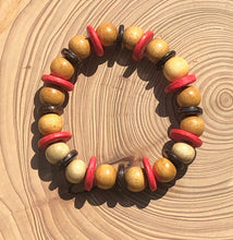 Load image into Gallery viewer, Handmade beaded bracelet on elastic. Made out pink, brown and beige recycled beads.
