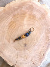 Load image into Gallery viewer, Keyring with blue and gold Wooden Beads and Faux Suede Cord - Chic Split Ring Accessory, Perfect Gift
