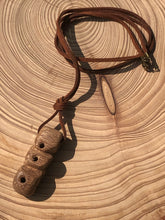 Load image into Gallery viewer, Hand made boho style necklace with hand carved pendant and vintage beads. On faux suede cord with metal fastening
