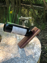 Load image into Gallery viewer, Balancing bottle holder, gravity illusion floating wine bottle stand. Novelty gift for Father’s Day
