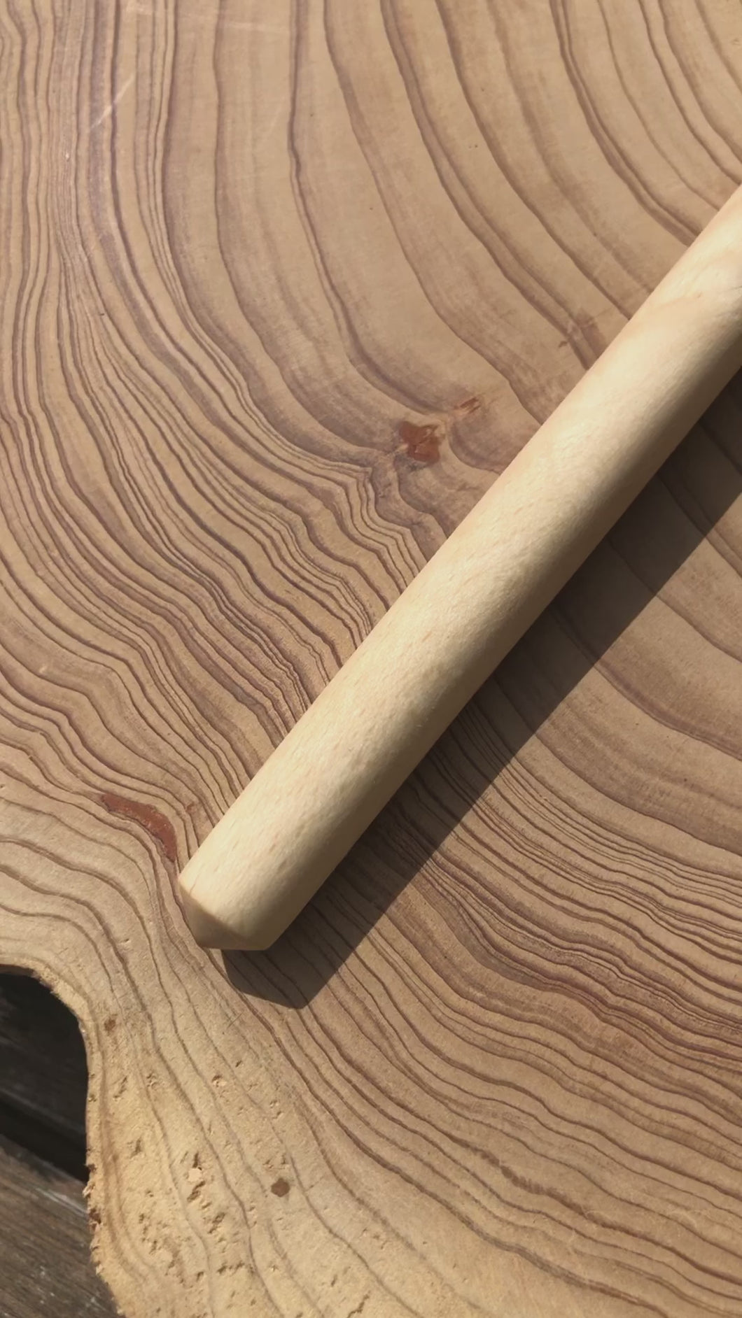 Decorative beech wooden spoon with pyrography detail of a yummy iced cupcake with wafer.