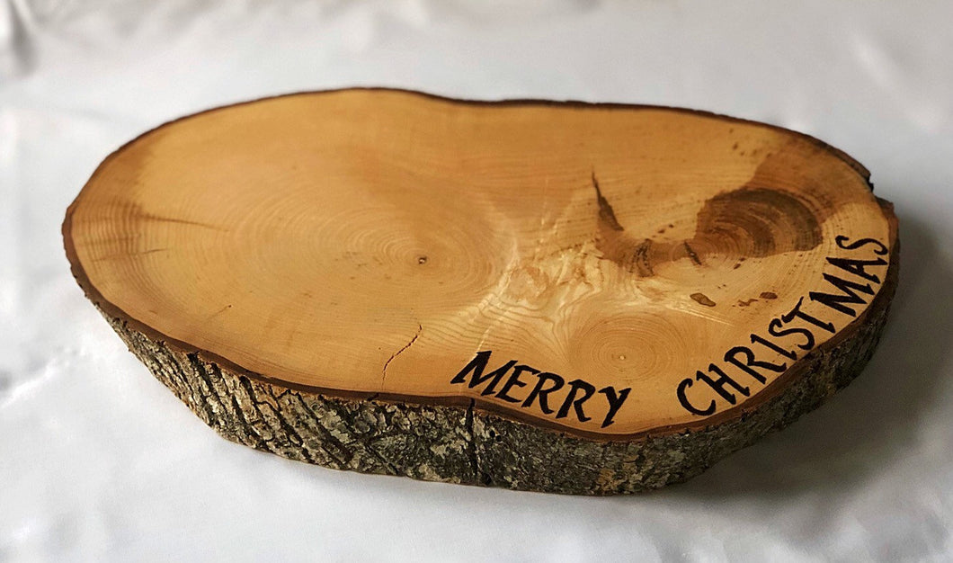 Christmas cake stand solid Ash, with Merry Christmas pyrographed detail.