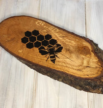 Load image into Gallery viewer, Bee and honey comb pyrography wood slice. Wood burning art on live edge ideal gift for nature lovers.
