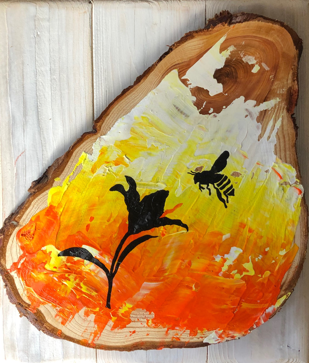 Painted wood slice with Bee and lilly detail